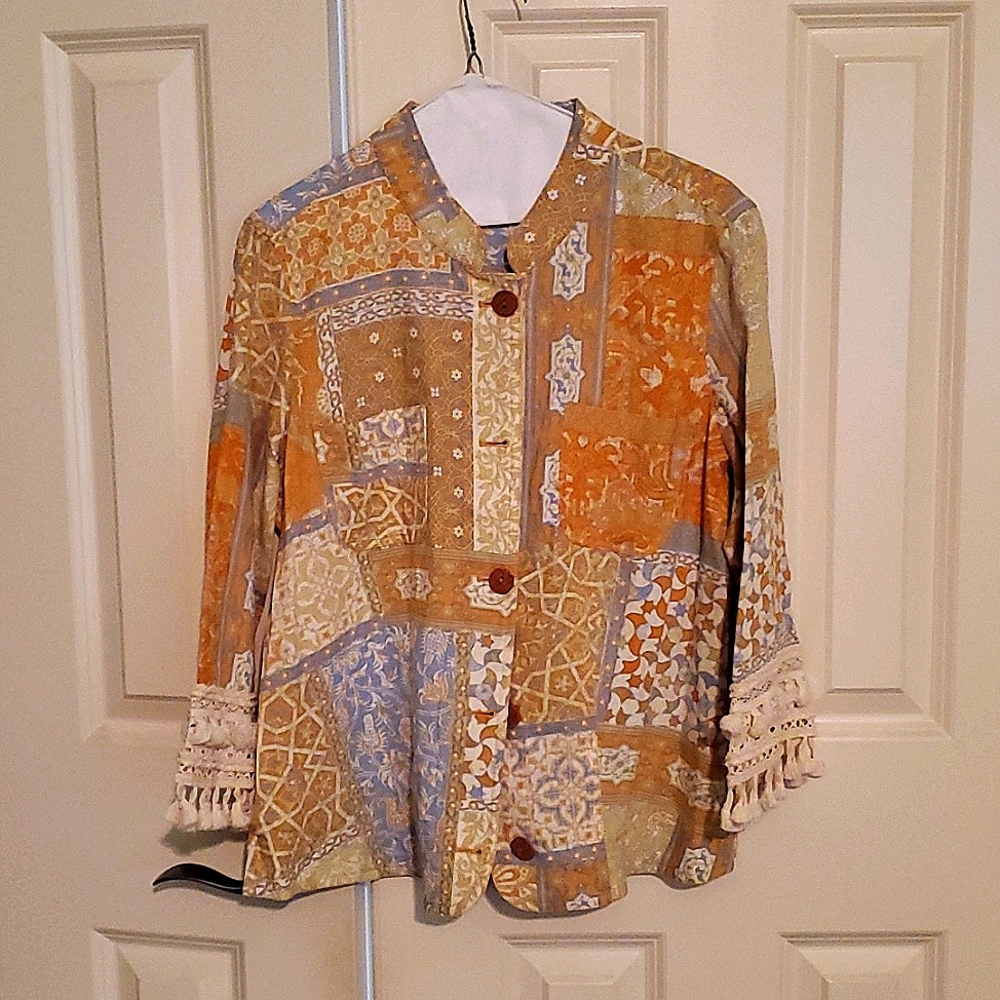 Light weight spring jacket to wear with skirt, slacks or jeans.